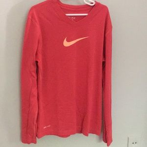 red and orange nike shirt